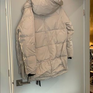 The Amazon Coat by OROLAY beige size L never worn